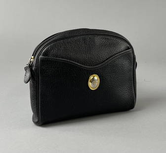 Vintage Christian Dior Black Calf Crossbody Bag: Christian Dior shoulder crossbody handbag purse in black grained calfskin with a gold toned signature medallion. Zipper closure with front slip pocket. 9" x 7" x 2". CONDITION: Light wear overall, a