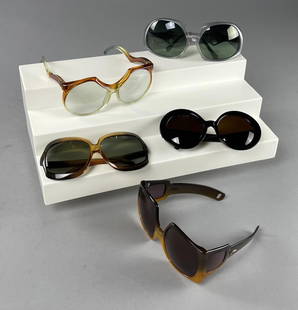 Five Pairs Vintage High Fashion Sunglasses: Including Katharine Hamnett, Christian Dior, Bausch & Lomb Ray-Ban and Foster Grant. CONDITION: Previously owned but we found no serious signs of wear. SHIPPING: In-House Shipping Available for this l