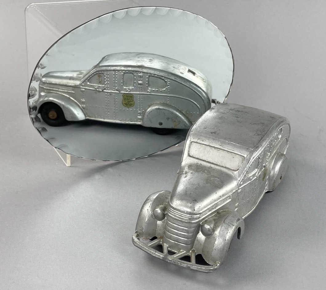 Vintage Cast Iron Brink's Junior Armored Car: Mirror NOT included. SHIPPING: In-House shipping available. Please read our Shipping Policies prior to bidding.