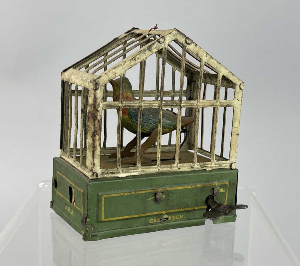 J.A.J. Tin Litho Wind-Up Bird in Cage (1 of 5)