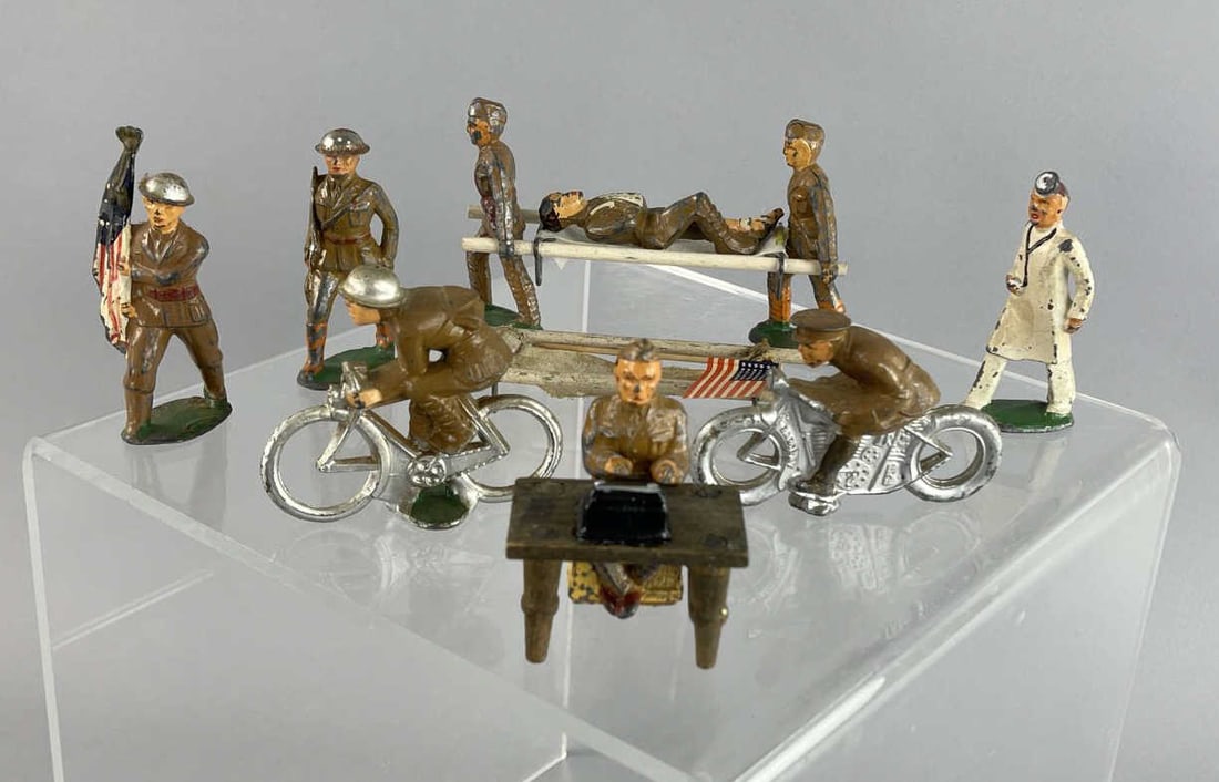 Vintage Barclay Manoil Lead Soldiers: Soldier on bike, soldier on stretcher, doctor, soldier at desk with typewriter, flag soldier SHIPPING: In-House shipping available. Please read our Shipping Policies prior to bidding.