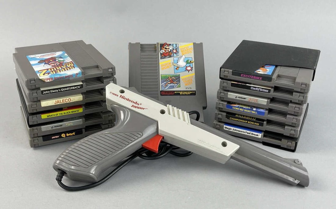 13 NES Cartridges Games & Nintendo Zapper: Championship Bowling, Tecmo NBA Basketball, Konami Blades of Steel, Ultra Q*bert, The Adventures of Bayou Billy, Super Mario Bros./Duck Hunt/World Class Track Meet, Deadly Towers, Wrath of the Black M