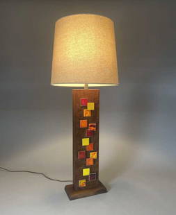 Harris Strong Midcentury Walnut and Tile Lamp: Midcentury modern design from Harris Strong (American, 1920-2006). A tall walnut table lamp with glazed ceramic tile decoration on front and back. Height to top of finial 39-1/2", to tip of socket 30-