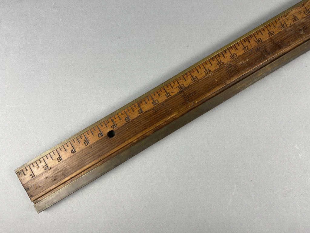 7' Ridgely Pine & Brass Wallpaper Straight Edge: 7' (84") Ridgely pine and brass wallpaper straight edge ruler, marked "Ridgely" and "Made in USA" on top side, circa early 20th Century.