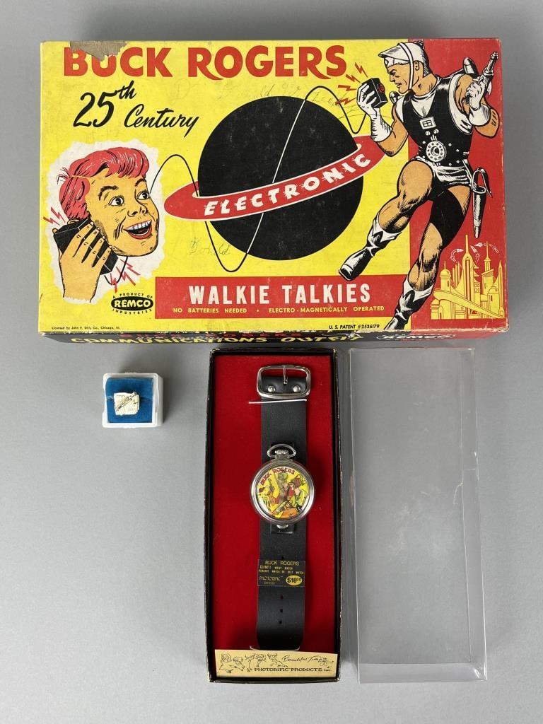 Buck Rogers Walkie Talkies & Wrist Watch, Ring: Buck Rogers 25th Century Communications Outfit walkie talkies in original box. There is writing on the box and some damage to the box. REMCO Industries.Photorific BR1000 Buck Rogers Giant Wrist Watch,