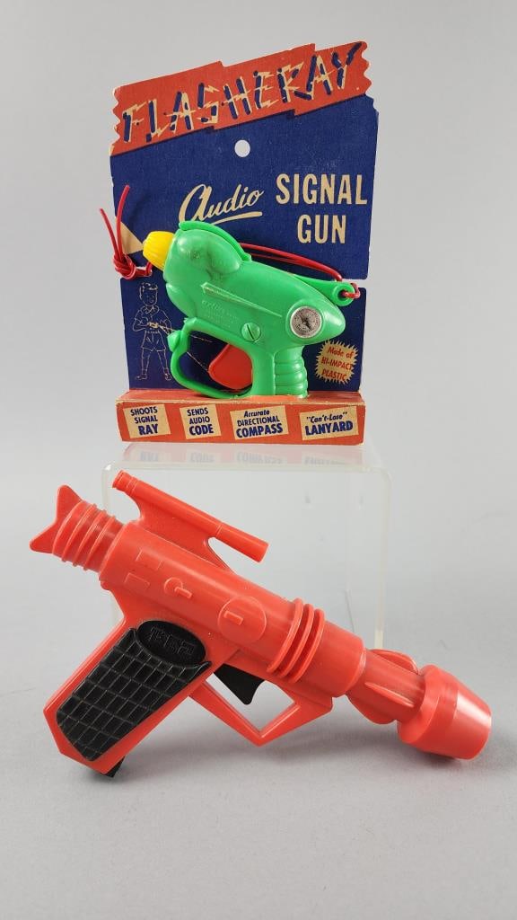 Pez Space Gun and Flasheray Audio Signal Gun: Pez Space Gun 8.25'' x 4.75'', Made in Austria.Arliss Company, Inc. Flasheray Audio Signal Gun with paper backing.
