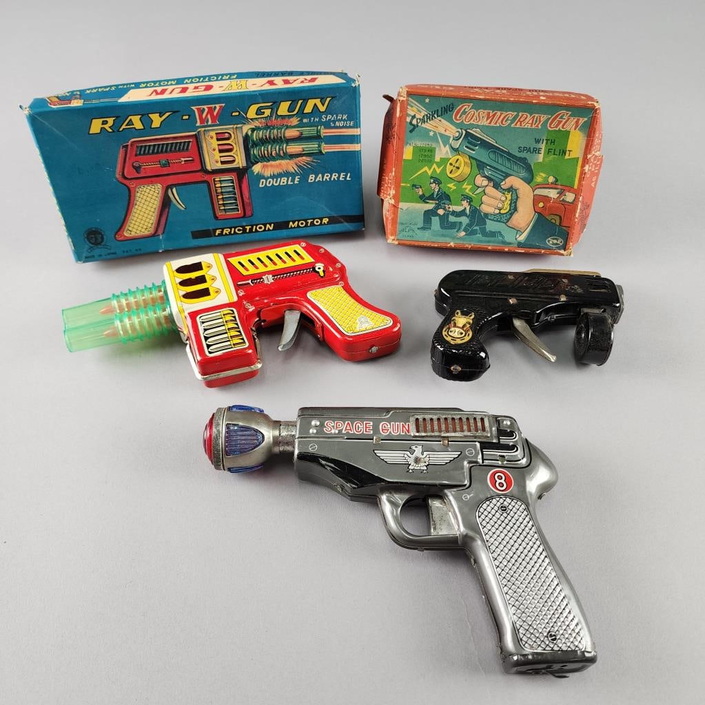 Japan Ray-W-Gun, Space Gun and Cosmic Ray Gun: Double Barrel Ray-W-Gun in original box.Battery operated Space Gun no box.Sparkling Cosmic Ray Gun in original box.