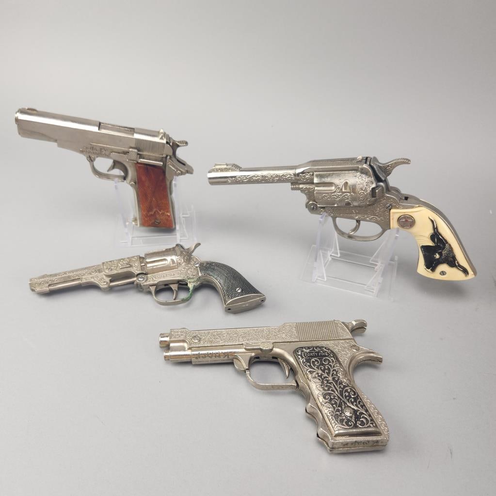 Hubley Automatic, Coyote, Texan Jr and Forty Five: Hubley Automatic cap gun, appx. 6.5'', plastic grips are warped.Hubley Coyote cap gun, appx 8.25''.Hubley Texan Jr cap gun, appx. 9.75''.Hubley Forty Five cap gun, appx. 7'', hammering mechanism is br