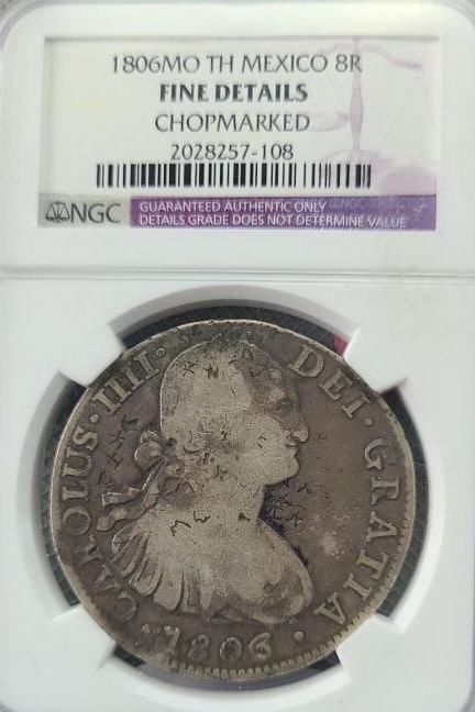 1803 Spanish Colonial 8 Reales "Pirate Money": Minted in Mexico City - "MO", was Legal Tender in Early America until 1857. About 10 small chop Marks Showing that Chinese Merchants Approved as good Silver.