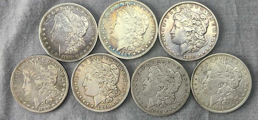 7 pcs Morgan Silver Dollars (1 of 2)