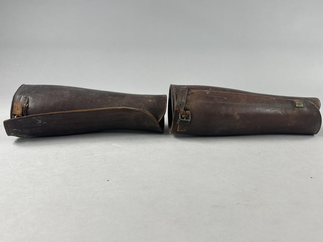 Original WWI U.S. Cavalry Leather Gaiters: WWI U.S. Cavalry leather gaiters - straps still intact - measure 12" tall and 15.5" around the largest part of gaiter.
