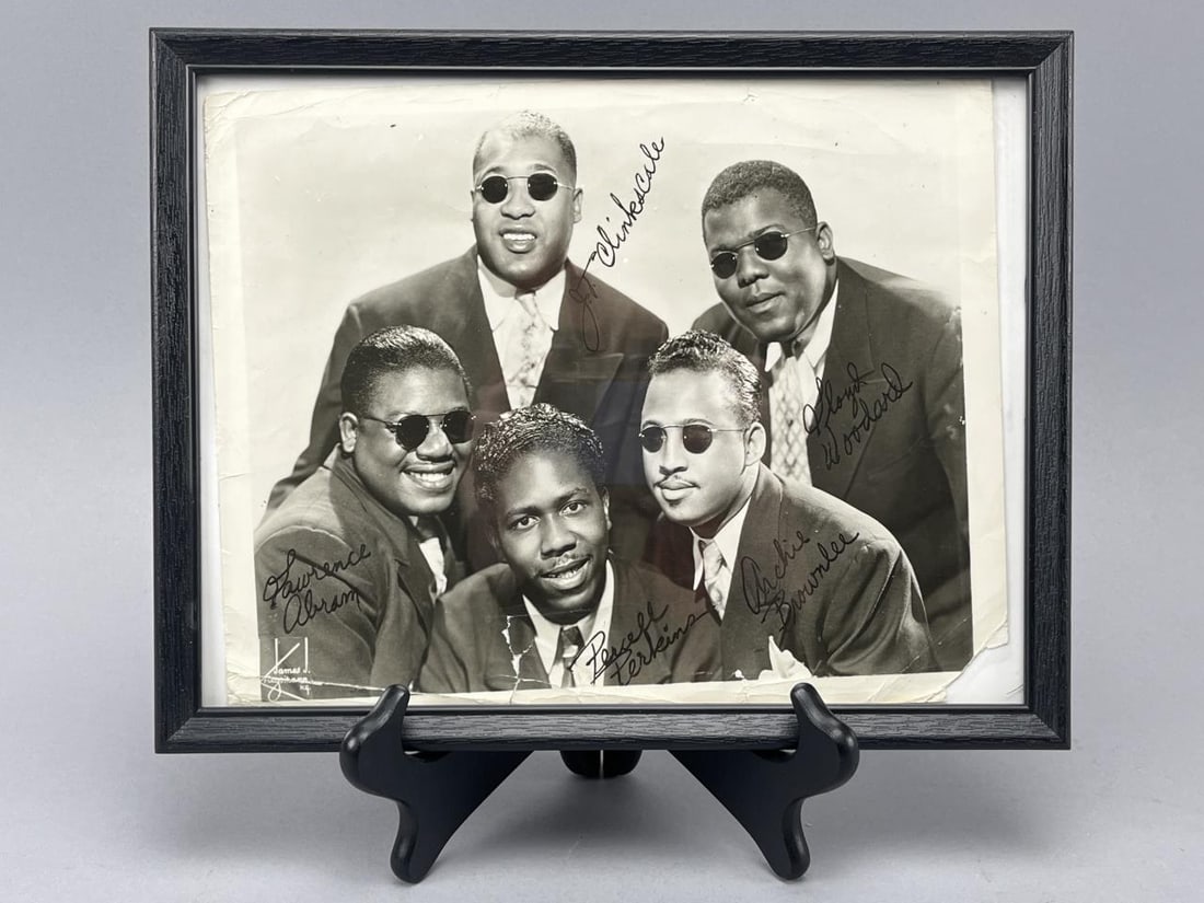 Five Blind Boys of Mississippi Autographed Photo: Framed autographed 8" x 10" black and white photo of the Black Gospel quartet, The Five Blind Boys of Mississippi, signed by Archie Brownlee, Lawrence Abrams, Lloyd Woodard, J.T. Clinkscales, and Perc