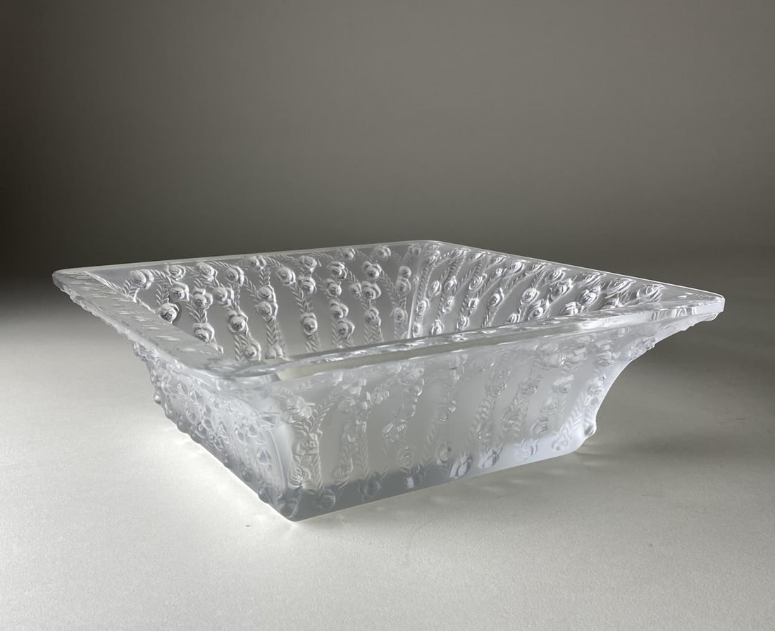 Lalique "Roses" French Crystal Centerpiece Bowl: Square crystal bowl from Lalique France in the Trellised Roses pattern. It measures 9-5/8" square. Signed "Lalique France" on underside as shown.