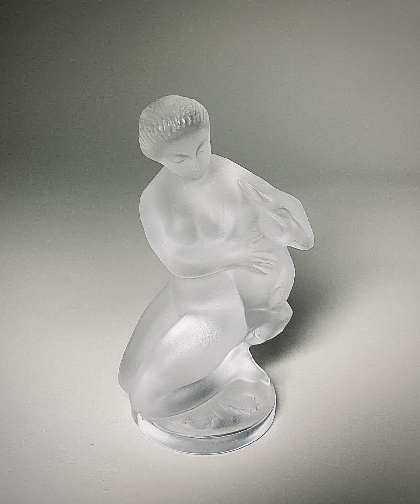 Lalique French Crystal Diana the Huntress & Fawn: Lalique "Diana the Huntress and Fawn," frosted French art glass figure, designed in 1960 by Marc Lalique (French 1900-1977), engraved signature, "Lalique France," on underside, 4-1/2" in height.