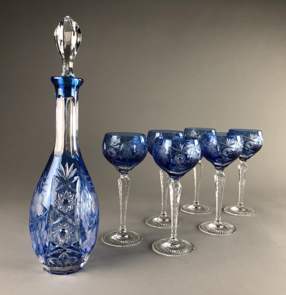 Bohemian Cobalt Blue Cut to Clear Decanter Set: Bohemian cobalt cut to clear glass wine decanter, with stopper and six matching glasses, the decanter is 15-1/2" H.
