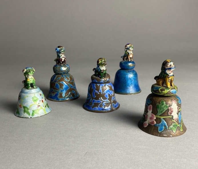 5 Chinese Enamel Bells Foo Dog Handles: Appear to be brass with silver plated interiors and enamel decoration. Height of the tallest is 3-3/4".