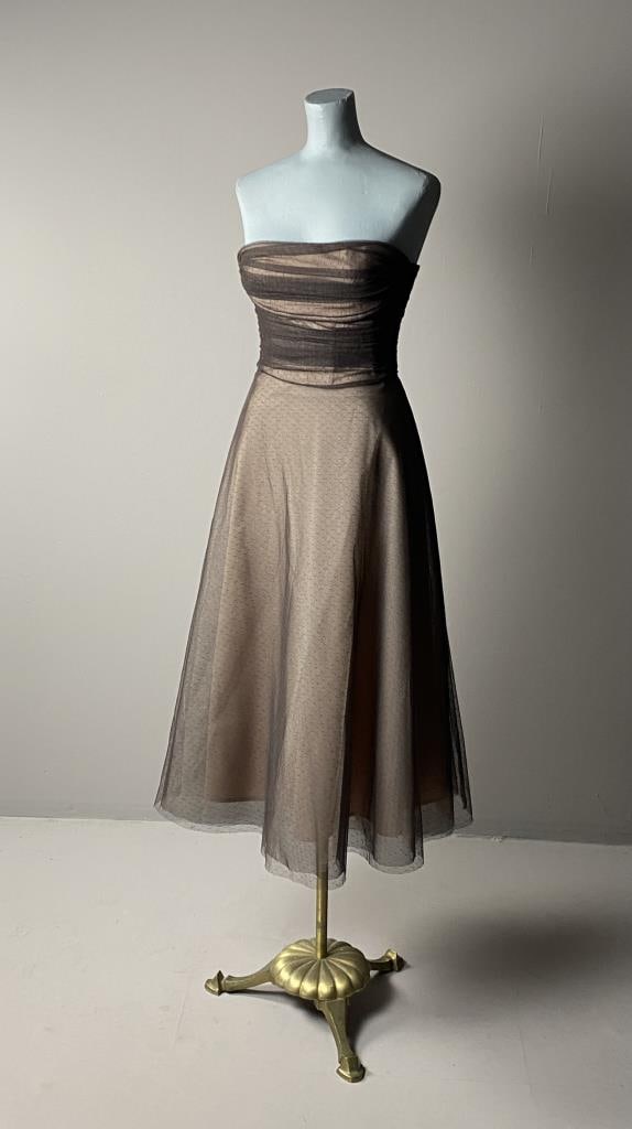 BCBG Max Azria Brown Tulle Party Dress: Brown tulle strapless dress with a ruched bodice. Marked size 4. SHIPPING:In-House Shipping Avai