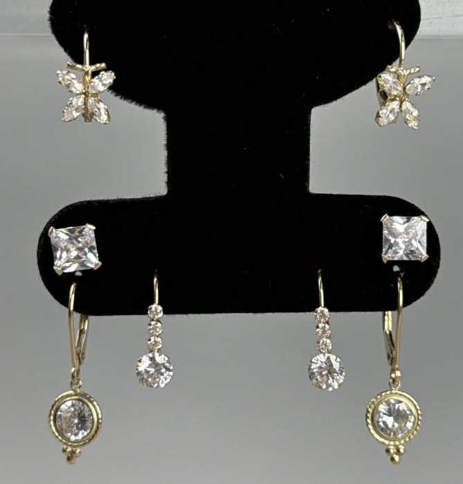 4 Pair 10K Yellow Gold Earrings: 4.00 grams total weight.Bella Luce 4.20CTW square cut diamond simulant studs JTV BLG216, Bella Luce diamond simulant butterfly leverback earrings JTV BLG233, Bella Luce diamond simulant leverback earr