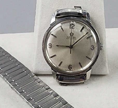 Omega Automatic 550 Watch Face Parts or Repair: Swiss made, 17 Jewels, 165.002 case. Crack on crystal and watch stretch band is broke off. From the collection of Kenneth Beachler.