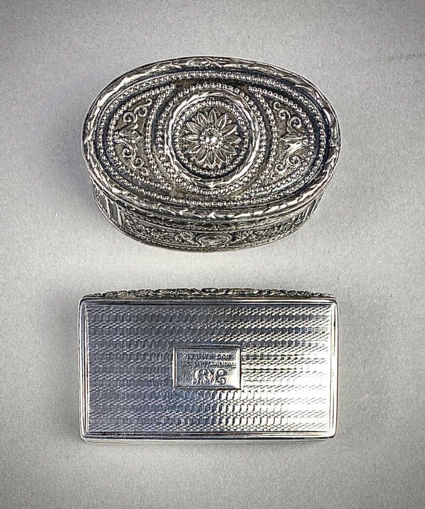 Two Antique Sterling Silver Snuff or Trinket Boxes: Two 19th century sterling silver boxes with Sterling hallmarks as shown. The two together weigh 149 grams.