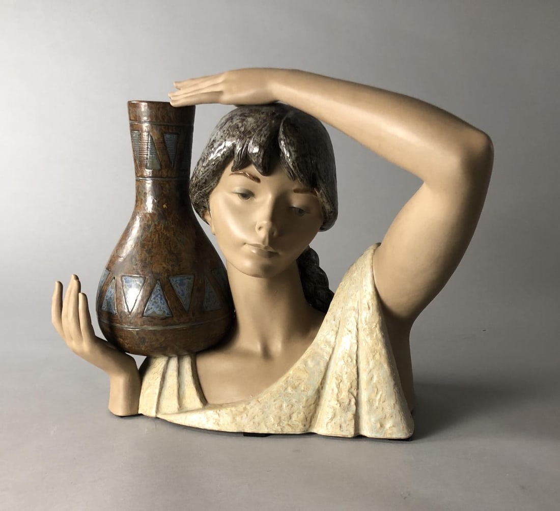 Lladro Girl Water Carrier Alfredo Ruiz 1970: Lladro "Girl Water Carrier" also known as "Busto de Aquadora," by Alfredo Ruiz, introduced in 1970 and retired in 1981, 15" Deep x 21" W x 16.5" H.