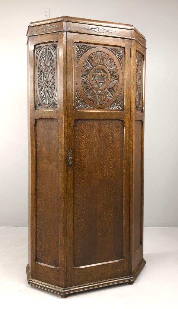 Antique Oak Judaica Cabinet with Star of David: Antique single door quartersawn oak cabinet or wardrobe, with three carved panels each featuring the Star of David,16-1/4" L x 36" W x 78-1/8" H.