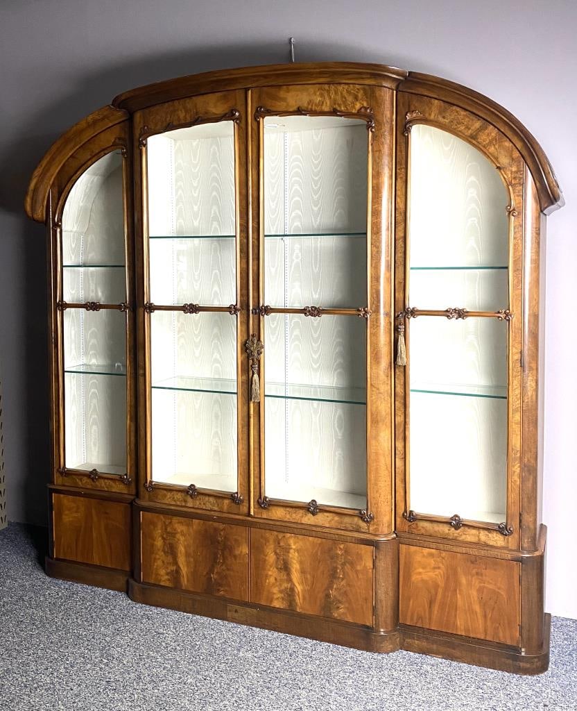 19th Century European Burl Wood Breakfront: Antique European burl wood breakfront, display cabinet, or vitrine, four glass doors above four wood doors, moire fabric lined interior with lights and glass shelves, circa 19th Century, constructed i