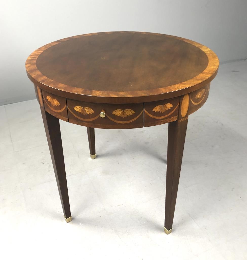 Baker Furniture Federal Inlaid Mahogany Table: Mahogany neoclassical style inlaid round accent table with two drawers and two candle slides, by Baker furniture Company (Grand Rapids Michigan), late 20th Century, 25-1/2" D x 25" H.