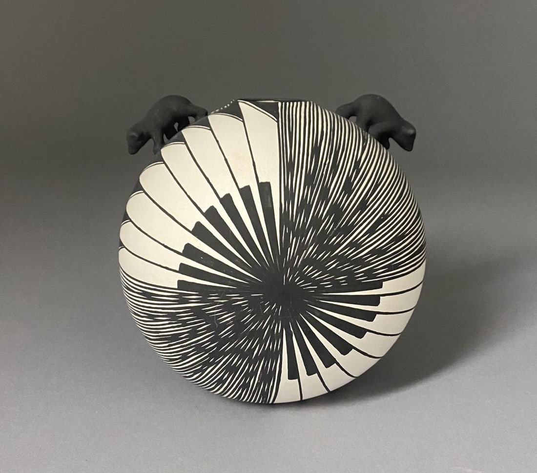 Acoma Fineline Pottery Seed Jar Jennifer Sanchez: Native American, Southwestern United States, New Mexico, Acoma Pueblo, coil pottery spherical seed jar having a small opening flanked by two figures of bears, thin-walled with fine line decoration, by