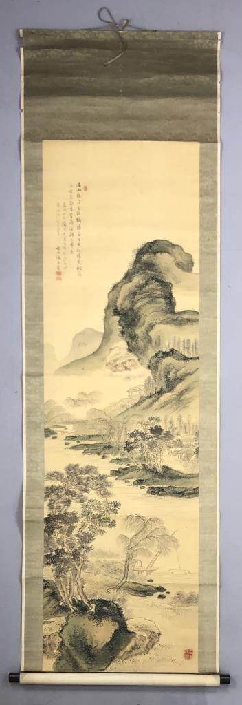 Chinese Guo Hua Scroll Painting Mountains: Traditional hanging Chinese Guo Hua scroll painting on silk mounted on a paper backing, with banded silk borders, depicting a mountainous landscape scene with one figure, signed and seal marked upper