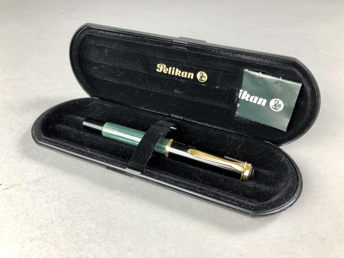 Pelikan Souveran Fountain Pen W. Germany: Pelikan Souveran fountain pen, black - green, marked "W. Germany", with 14k gold F nib stamped "14C-585", circa 1987 - 1992, 4-15/16" (125 mm) in length closed, 5-3/4" (146mm) in length posted, with c