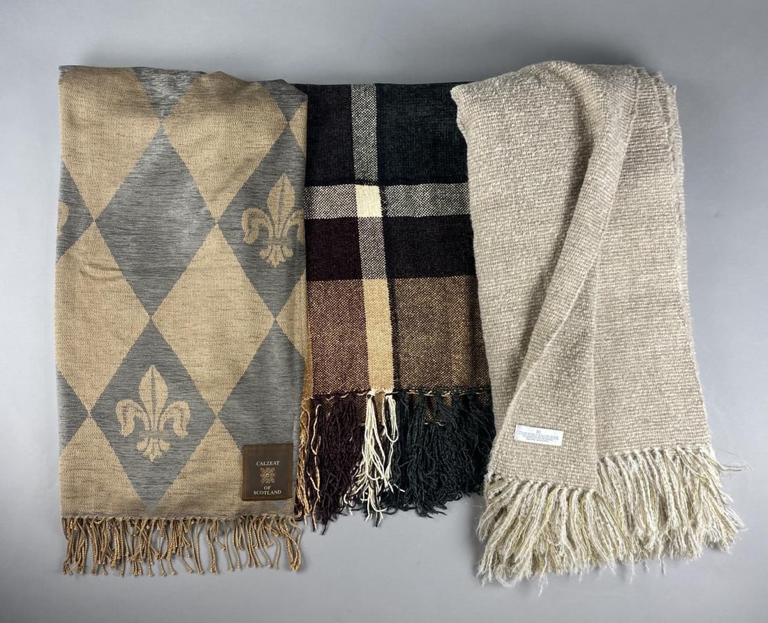 3 Throws: Restoration HW, Calzeat of Scotland: Restoration Hardware Alpaca blend throw blanket, 52" x 72". Calzeat of Scotland rayon throw blanket, 50" x 60", and unlabeled plaid chenille throw blanket, 41" x 75".