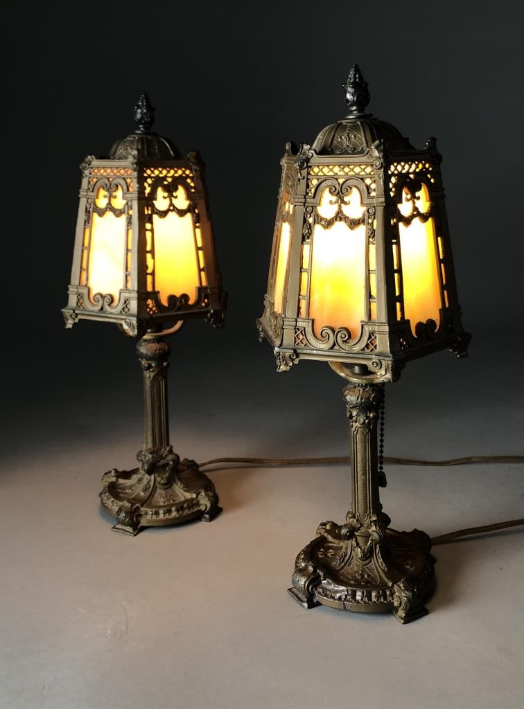 Pair of Antique Carmel Slag Glass Boudoir Lamps: Pair of antique boudoir or vanity lamps, painted cast spelter metal, with carmel slag glass inset panels, 14-5/8" H.