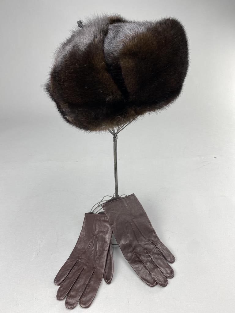 Mens Mink Hat & Leather Gloves: Handmade mink Ushanka ear flap hat, ties on top for regular wear or under chin for cold conditions. Gloves are leather, size 8-1/2.