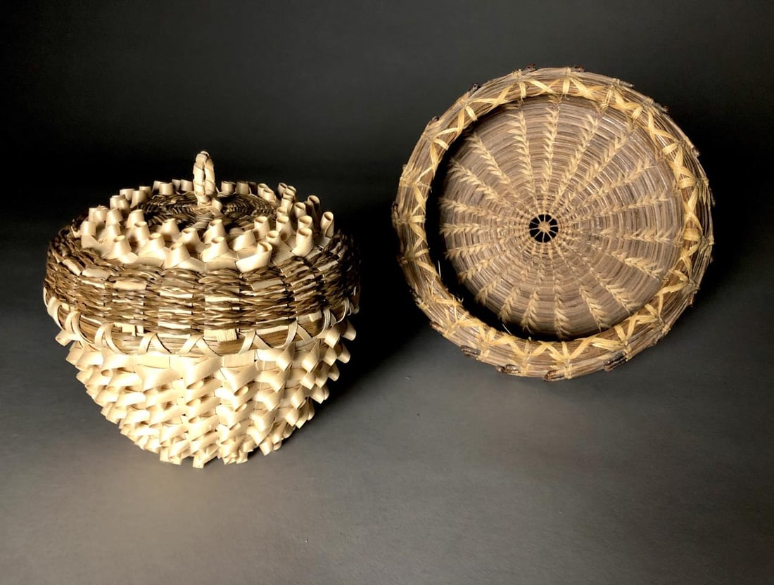 2 Native American Baskets Splint Curl Pine Needle: Two Native American baskets. A splint curl, or porcupine coil curl, ash and sweet grass covered basket by the Akwesasne Mohawk basket maker Florence Cook, signed on bottom, (5-3/4" D x 5-1/2" H) and a