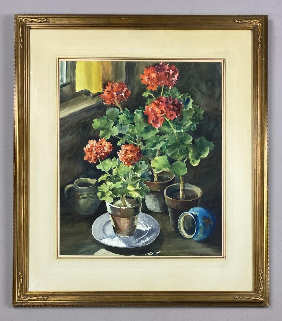 Martha K. Schauer (American 1889-1985) Watercolor: Original watercolor by listed Ohio artist Martha K. Schauer depicting an interior still life with geraniums. Signed lower right. Circa early to mid 20th century in period frame and mat under glass.Fra