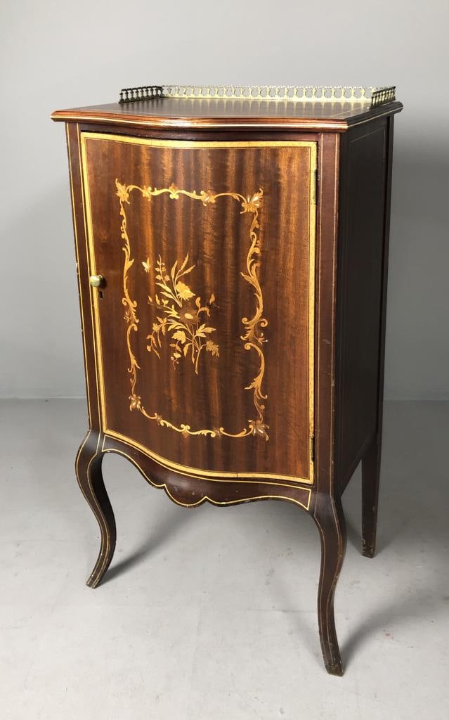 Edwardian Music Cabinet with Marquetry: Antique Edwardian music cabinet with mixed woods and mother of pearl inlay and marquetry, circa 1900-1910, 16-1/2" L x 22" W x 41-1/3" H.