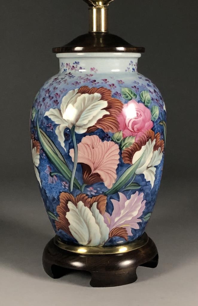 Frederick Cooper Porcelain Floral Table Lamp: Frederick Cooper (Chicago, Illinois) hand painted porcelain table lamp with floral decoration on a wood base, labeled on socket, approximately 29" inches height including finial.