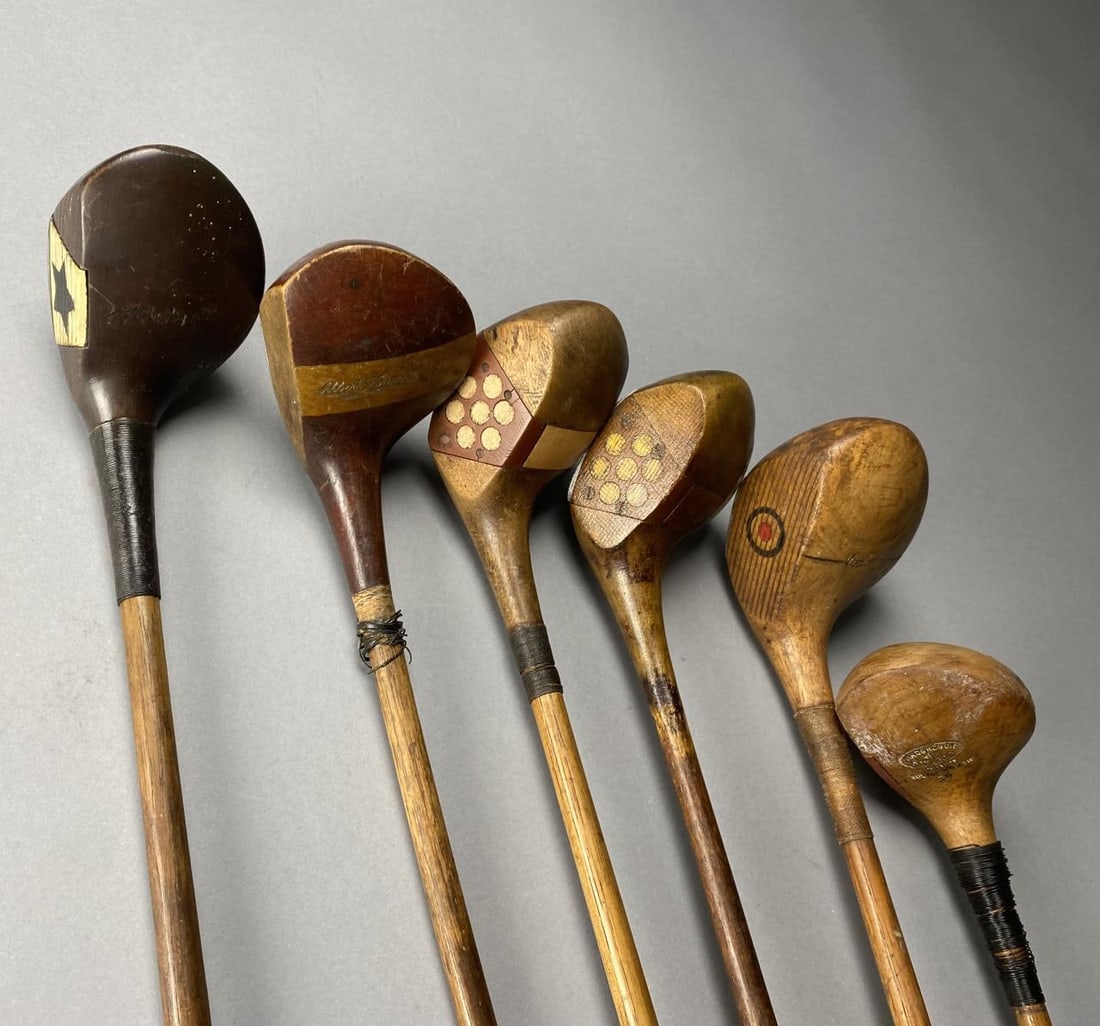 Six Antique R. H. Hickory Shafted Wood Golf Clubs: Six wood golf clubs, one Spalding 44" 1 wood driver, one Albert Foriman 42" 5 wood spoon, one Walker Wilson Gup Special 42-3/4" 5 wood spoon, one Thos. E. Wilson 43-1/2" 2 wood Brassie Gup, a Crawford