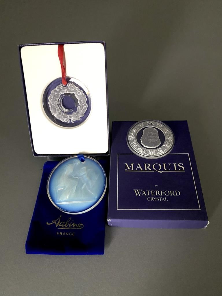 1 Sabino & 2 Waterford Crystal Christmas Ornaments: A Sabino Crystal Co. Cameo Guardian Angel (with Musician) ornament, 2-1/2" dia. and signed on reverse side, and two Marquis by Waterford Crystal 2" wreath and Santa crystal coin ornaments, wreath has 