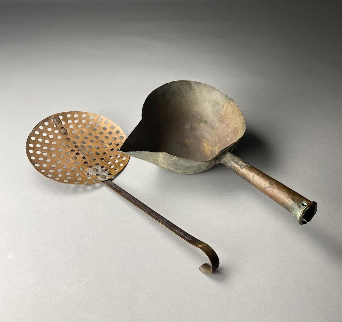 Copper Dipper and Copper Skimmer: Copper dipper with 6-1/2" copper handle, 8" dia, x 4" deep, and copper skimmer or strainer, 8" dia, with 10" steel handle. No makers marks. Provenance: Schiappacasse's Candy Kitchen, Flint, Michigan (