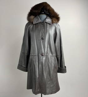 Nina Ricci Brown Leather Coat w Fox Trim: Dark brown Nina Ricci leather swing coat with removable fox fur trimmed hood in size M, mid thigh length.