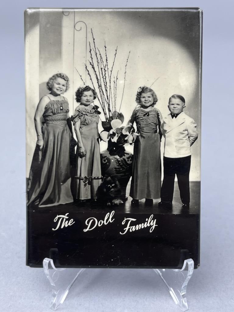 1930's "The Doll Family" Purse Mirror: They performed in The Wizard Of Oz & Freaks movies. Mirror measures 3" x 2".