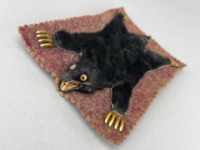 Bear Rug Of Real Fur, 1920-1950: Was once on burgundy velvet but has faded with time. 9 1/2 x 5 1/4' Glued on to rug. This is real fur. In very good condition. Glass eyes. Stone nose. Molded teeth. Extremely well made. 