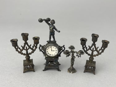 Metal Figural Clock And Candle Stands