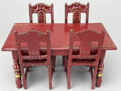 Arcade Toys Dining Room Table & Chairs: 1920-46 burgundy table and chairs. Great condition, Cast Iron, #721 and #725. Table is 6 1/4 x 3 1/2 x 3" tall. Chairs are 4 1/4" tall. 