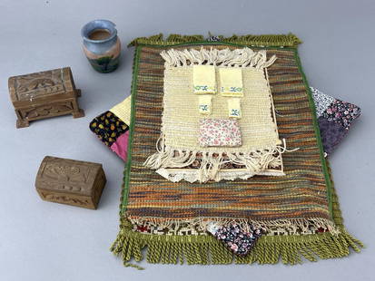 Vintage Rugs, Linens, Trunks And Crock: Lace tablecloth, Asian oilcloth carpet, patchwork quilt, needlework rug, 2 woven rugs. Set of yellow towels, pillow. Small and larger carved trunks. Mexican hand painted crock with a chip. 