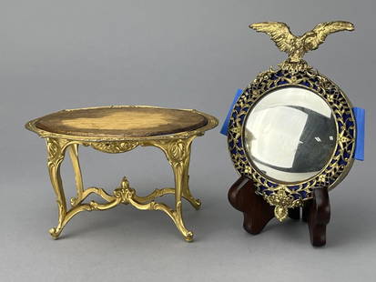 Gold Oval Center Table, Ormolu Eagle Mirror: Table could be E & S or Babette Schweitzer. 5 1/2 x 3 1/4 x 3 1/4" tall. Table top may be a replacement but fits the space perfectly. Mirror is 20th C. Trimmed in royal blue with brass