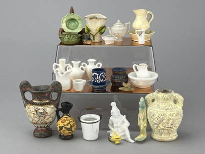Greek Urns, Porcelain And More: Hand decorated Greek urn, 2 3/4" tall. Occupied Japan urn, 2 1/2" tall. Greek pitcher with swan. Assorted porcelain. Signed pitcher with pink flowers, 1989. Bucket, pitcher and bowl and