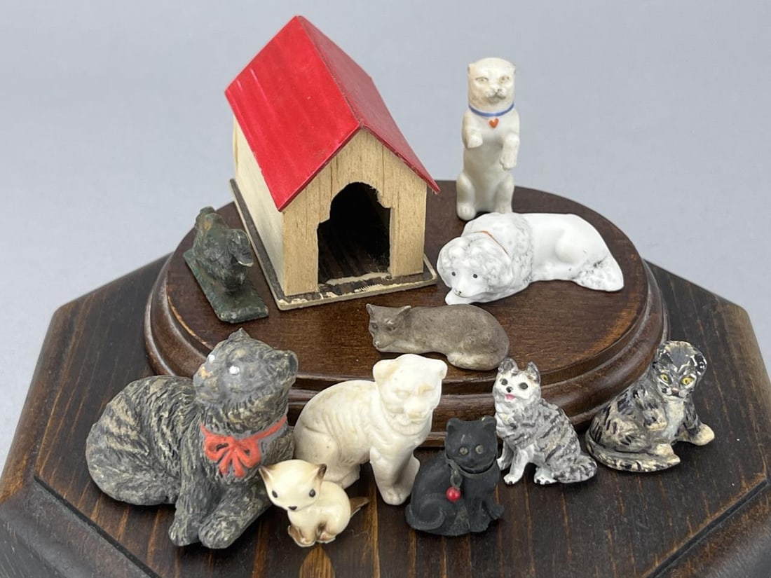 Taiwan Doghouse, Cats, Dogs And Duck: 7 cats, a metal duck snd 2 dogs. Dog house is 2 x 1 7/8 x 1 3/4", wood. Wood stands used in photos not included.